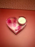 Waxinelicht houder met roze veren!