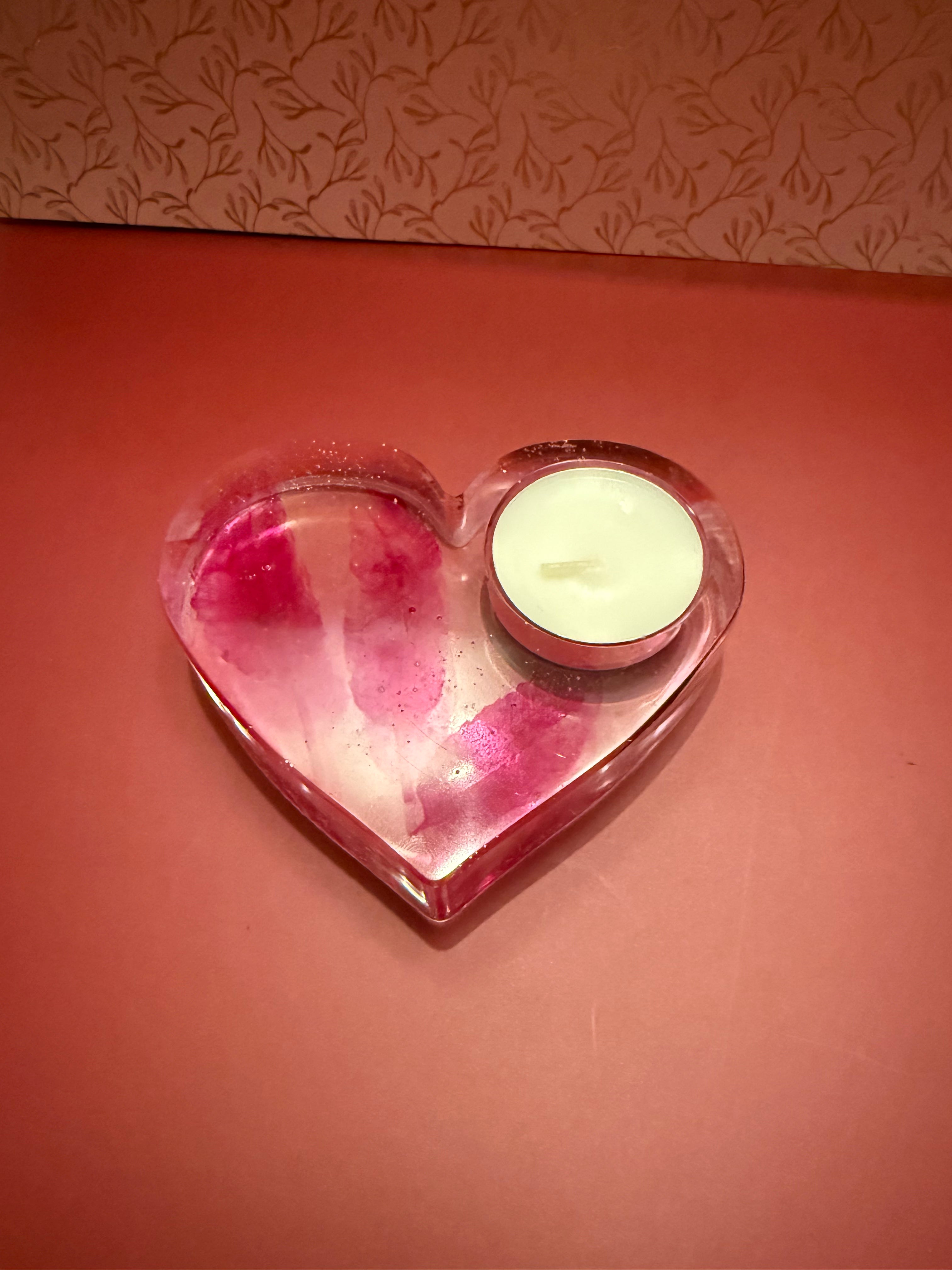 Waxinelicht houder met roze veren!